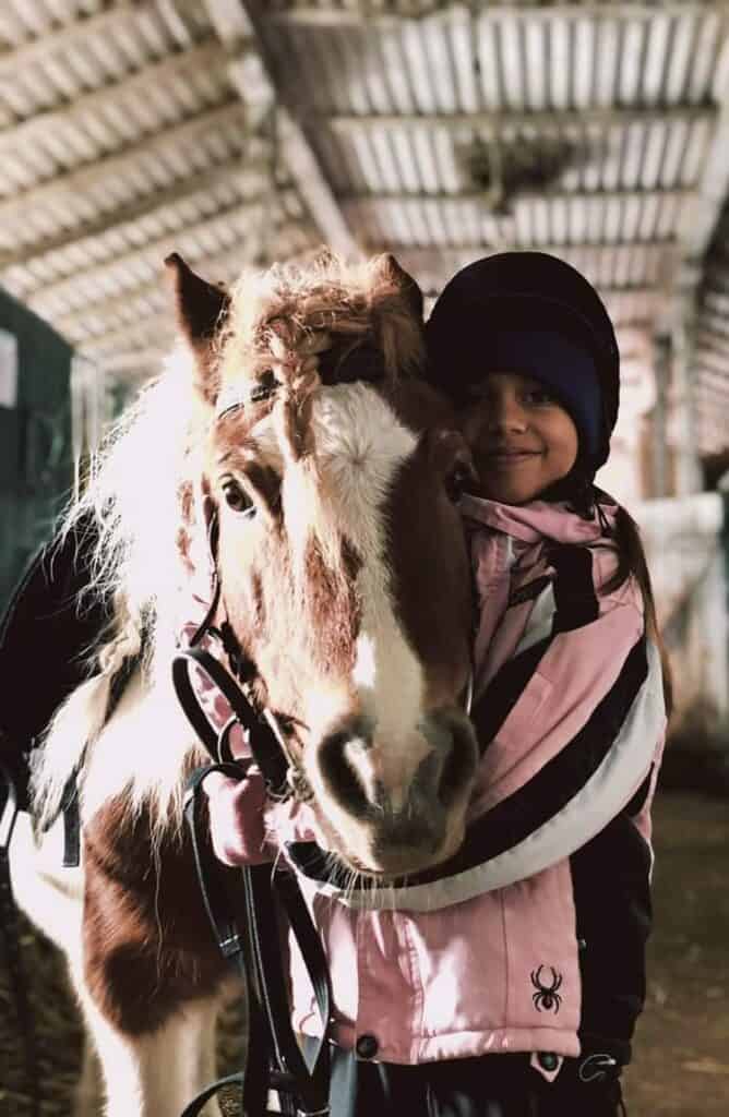 Ukranian Child with Pony - Image Courtesy of UECF.